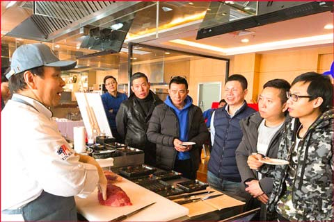 USMEF butcher and chef Kody Zhong presents a U.S. beef cutting demonstration during a USMEF training seminar promoting the use of alternative cuts