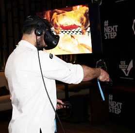 A chef participates in a virtual reality U.S. beef cutting demonstration
