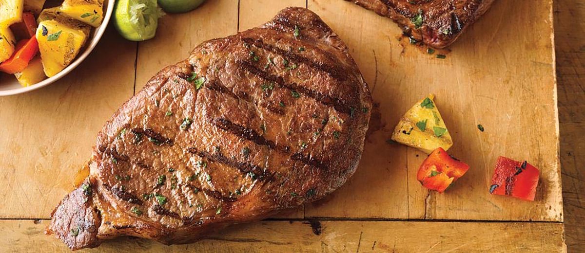 Hawaiian Ribeye Steaks with Grilled Pineapple Salad