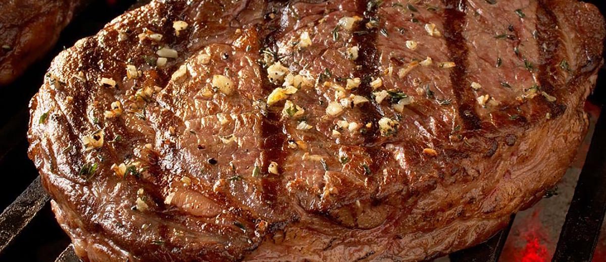 Ribeye Steaks with Blue Cheese Butter And Mushrooms