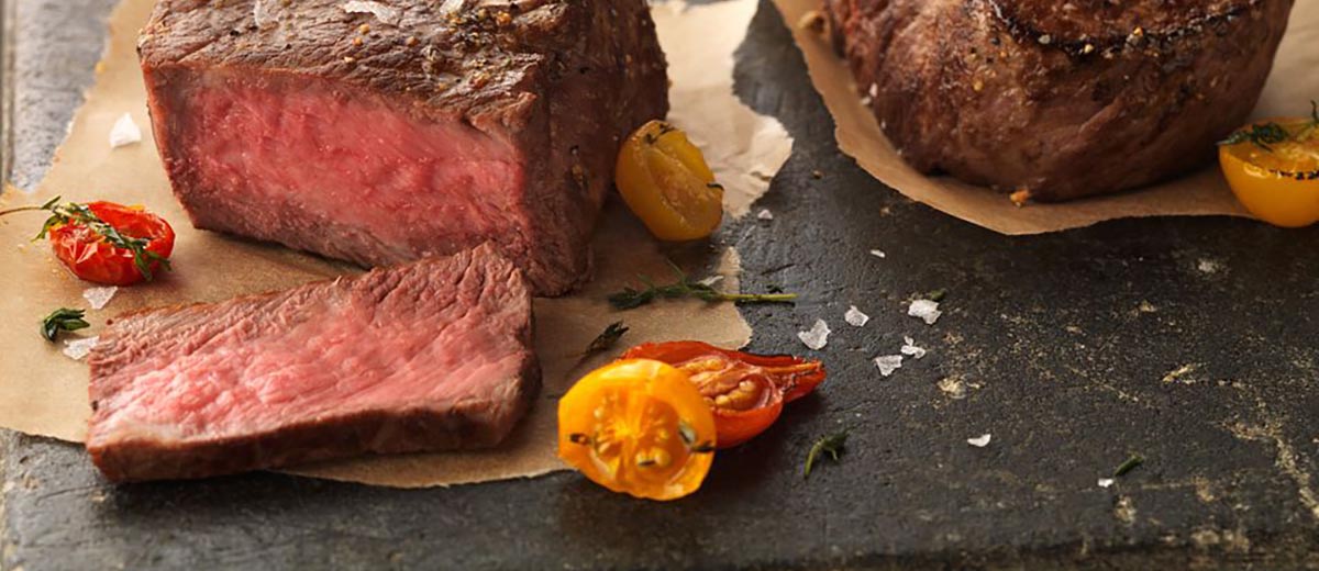 Lemon-Pepper Ribeye Filets with Roasted Tomatoes