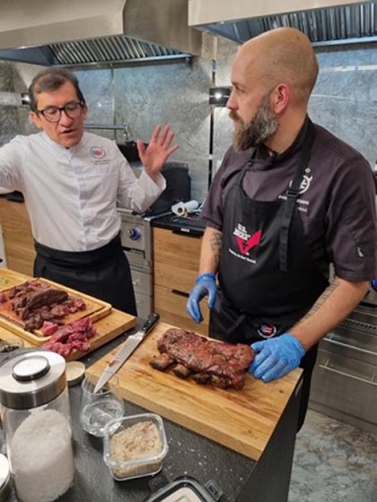 USMEF Mexico Executive Chef German Navarrete and social media influencer Kacper Salzman demonstrate U.S. beef preparation in Poland